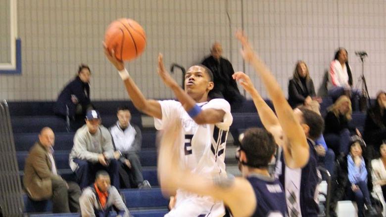 Dorian Broadwater going for a layup during basketball game